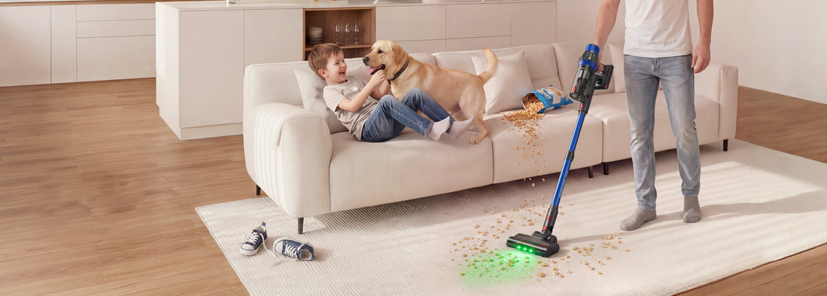 UNINELL UV7 cordless vacuum cleaning spilled cereal in a family living room